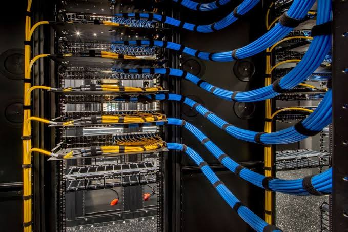 Structured cabling and patch panel installation in a server rack